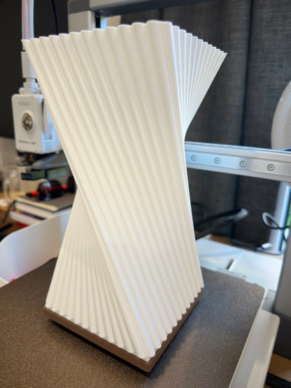 Twisted ribbed table lamp unlit, showing full sculptural form